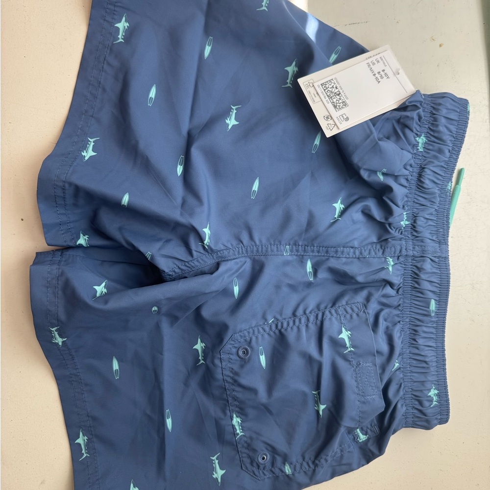 Boys size 8-10 Blue Swim Shorts with Surfboard Print